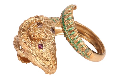 Lot 126 - A bangle and a ring of rams head motif design,...