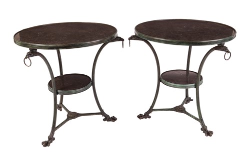 Lot 1 - A pair of black marble and bronze circular...