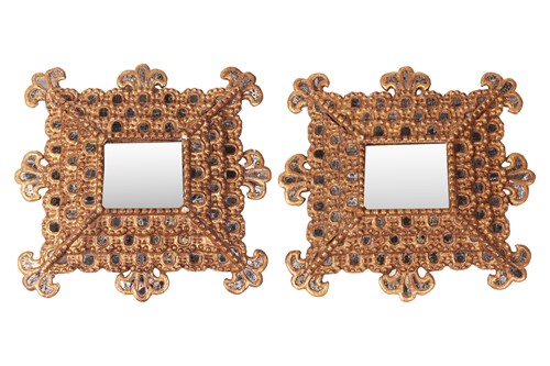 Lot 132 - A pair of decorative gilt wall mirrors, of...
