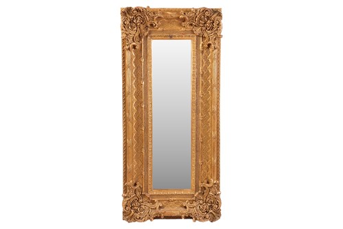 Lot 133 - A large rectangular giltwood wall mirror,...
