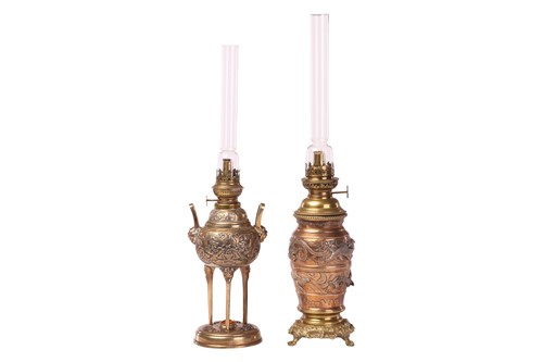 Lot 164 - Two decorative gilt-brass oil lamps, each in...