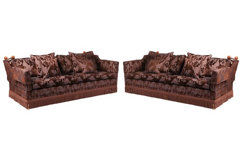 Lot 16 - A pair of Knowle two-seater sofas, with hinged...