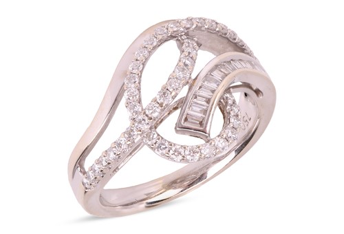 Lot 187 - A diamond-set dress ring, of scrolling design,...