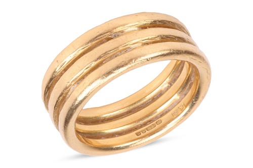 Lot 218 - A coiled band, composed of three rows...