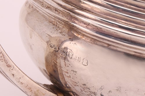 Lot 338 - A George III silver three-piece tea service,...