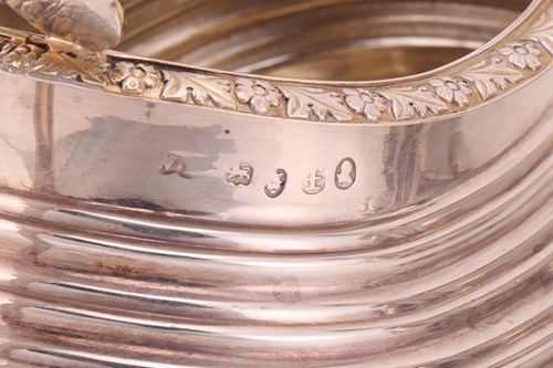 Lot 338 - A George III silver three-piece tea service,...