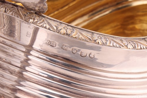 Lot 338 - A George III silver three-piece tea service,...