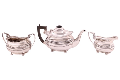 Lot A George V three-piece silver tea set,...