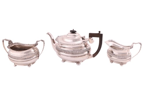 Lot A George V three-piece silver tea set,...