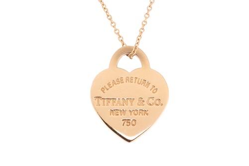 Lot A gold "Return to Tiffany" pendant necklace by...