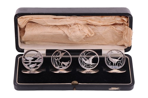 Lot 235 - A set of four bird silver placeholders, by the...