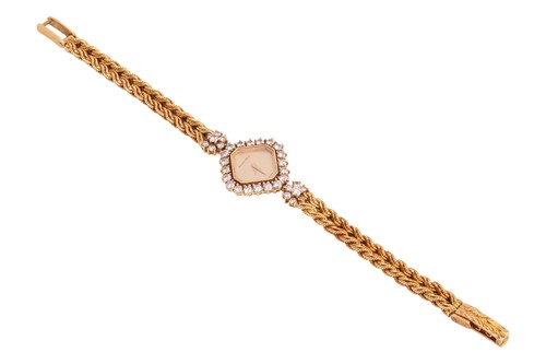 Lot A diamond-set ladies wristwatch by...
