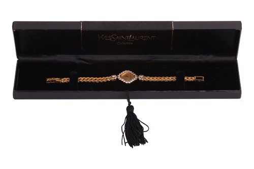 Lot A diamond-set ladies wristwatch by...