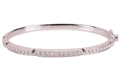 Lot A diamond-set hinged bangle by Boodles,...