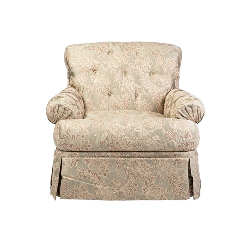 Lot 50 - A large button-back armchair, floral green...