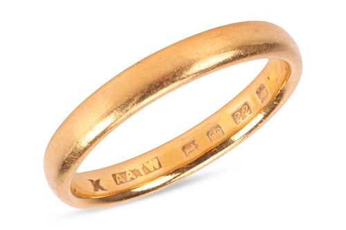 Lot 35 - A 22ct gold band ring, ring size K, weight 2.9...