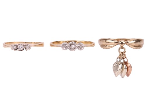 Lot 38 - A group of three rings; two set with three...