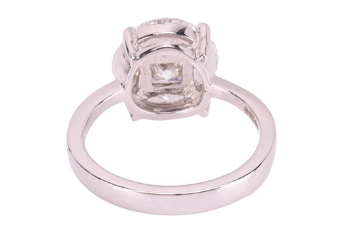 Lot A diamond cluster ring, illusion-set with a...