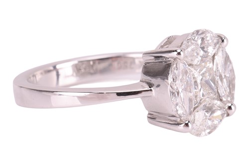 Lot A diamond cluster ring, illusion-set with a...