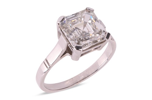 Lot A diamond single-stone ring, the Asscher-cut...