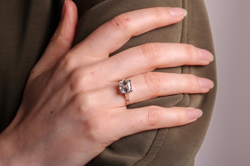 Lot A diamond single-stone ring, the Asscher-cut...