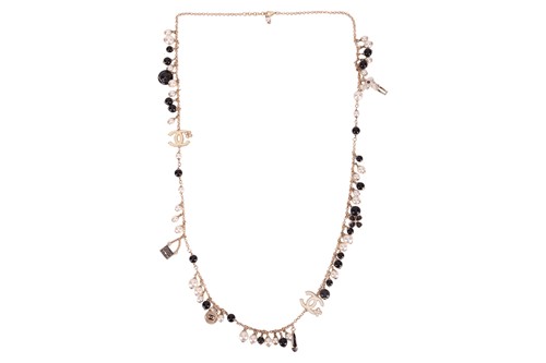 Lot 13 - An enamel Coco Mademoiselle long necklace,...