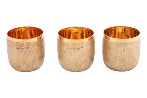 Lot Gerald Benney - three 18ct gold goblets and...