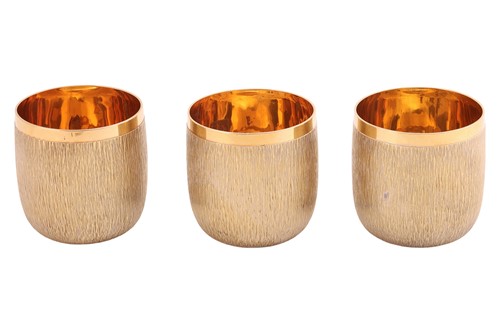 Lot Gerald Benney - three 18ct gold goblets and...