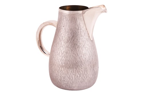 Lot Gerald Benney - a silver water jug, of...