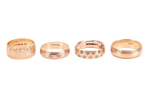 Lot 66 - Four 9ct gold band rings; one engraved with...