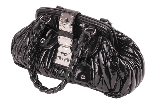 Lot 346 - Miu Miu - a Matelasse hobo bag in black patent...