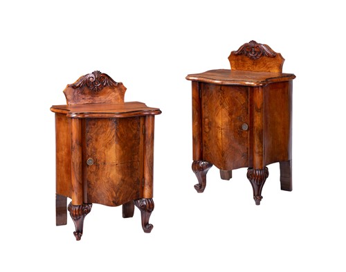 Lot 58 - A pair of Continental walnut bedside pot...