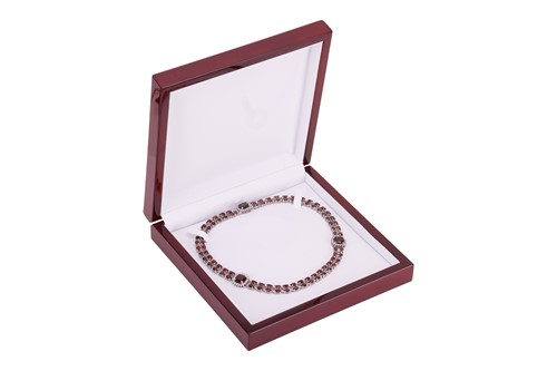Lot A garnet and diamond collar necklace, composed...