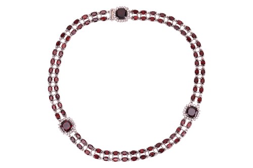 Lot A garnet and diamond collar necklace, composed...