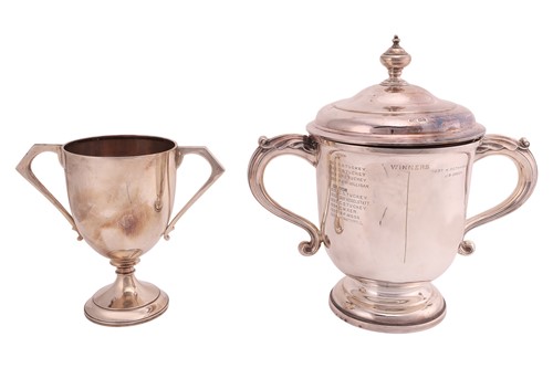 Lot 364 - Two large twin-handled silver trophies; the...