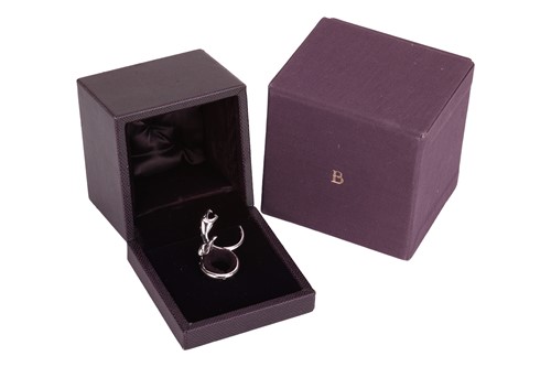 Lot 134 - Boucheron - A diamond-set Kaa Double Trouble...