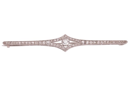 Lot A diamond bar brooch, circa 1915, the central...