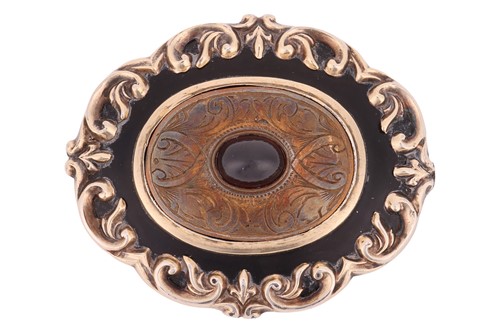 Lot 11 - A garnet-set mourning brooch, centred with a...