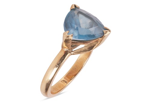 Lot 108 - A blue topaz single-stone ring, the claw-set...