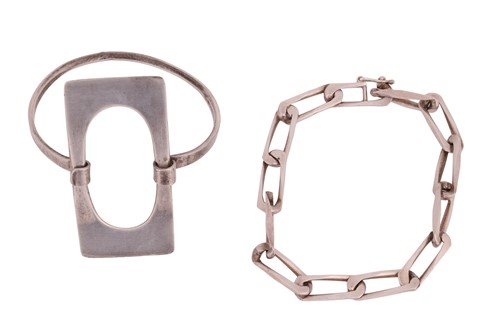 Lot 29 - Two bracelets, including, a white metal...