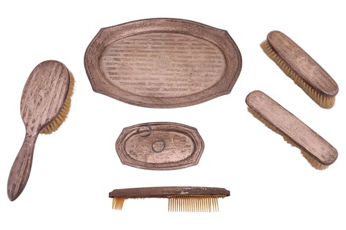 Lot 268 - A silver-mounted dressing table set, by Henry...