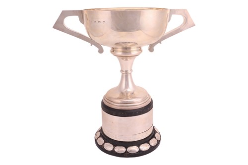 Lot 366 - An Art Deco twin-handled silver trophy cup,...