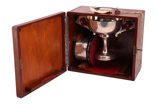 Lot 366 - An Art Deco twin-handled silver trophy cup,...