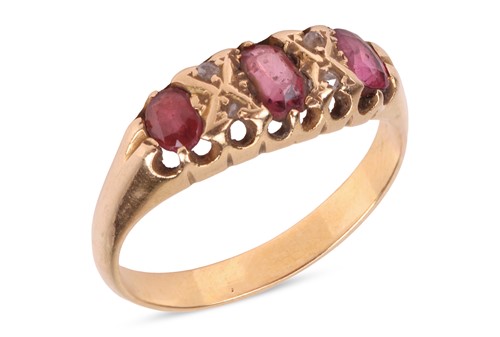 Lot 24 - A ruby, garnet and diamond ring, including two...