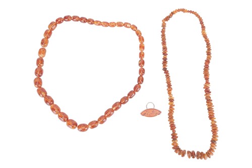 Lot 14 - Two reconstituted amber bead necklaces, with a...
