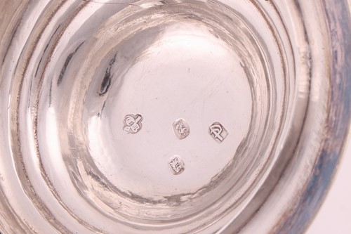 Lot 310 - A Queen Anne silver lidded tankard, London...