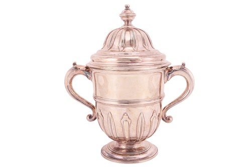 Lot A large George II twin-handled cup and cover,...