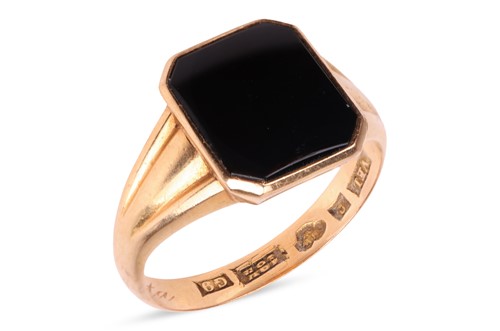 Lot 4 - An onyx set signet ring, with British...