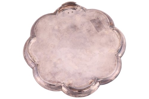 Lot A George I silver salver, plain octofoil form,...
