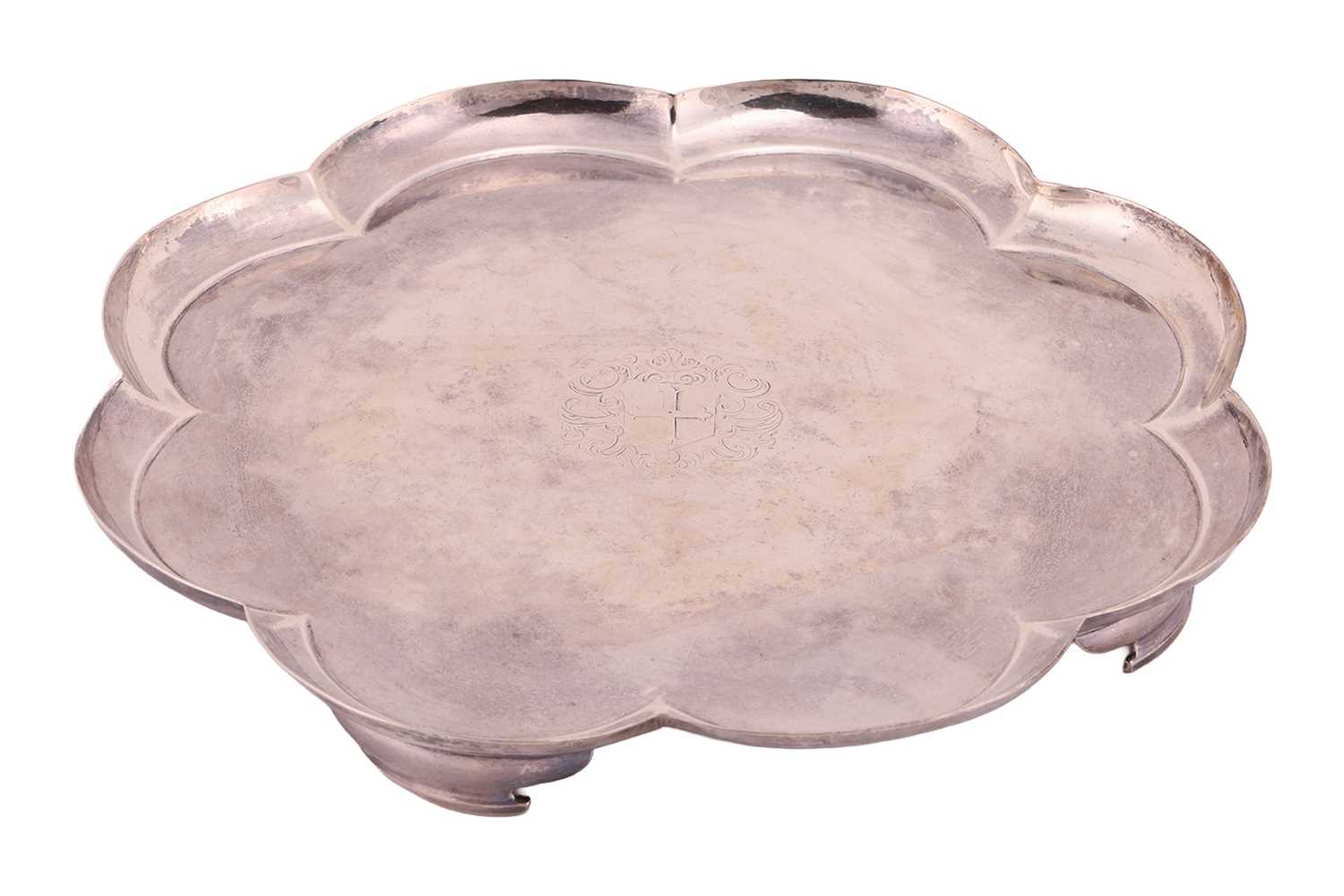 Lot A George I silver salver, plain octofoil form,...